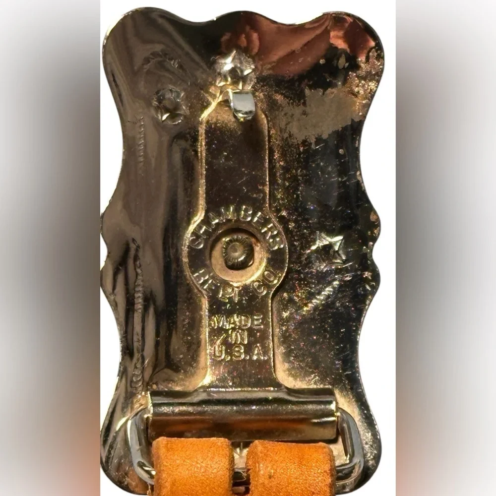 Chambers Belt Co. tooled Leather Brown Men’s Belt with spinning Revolver buckle.